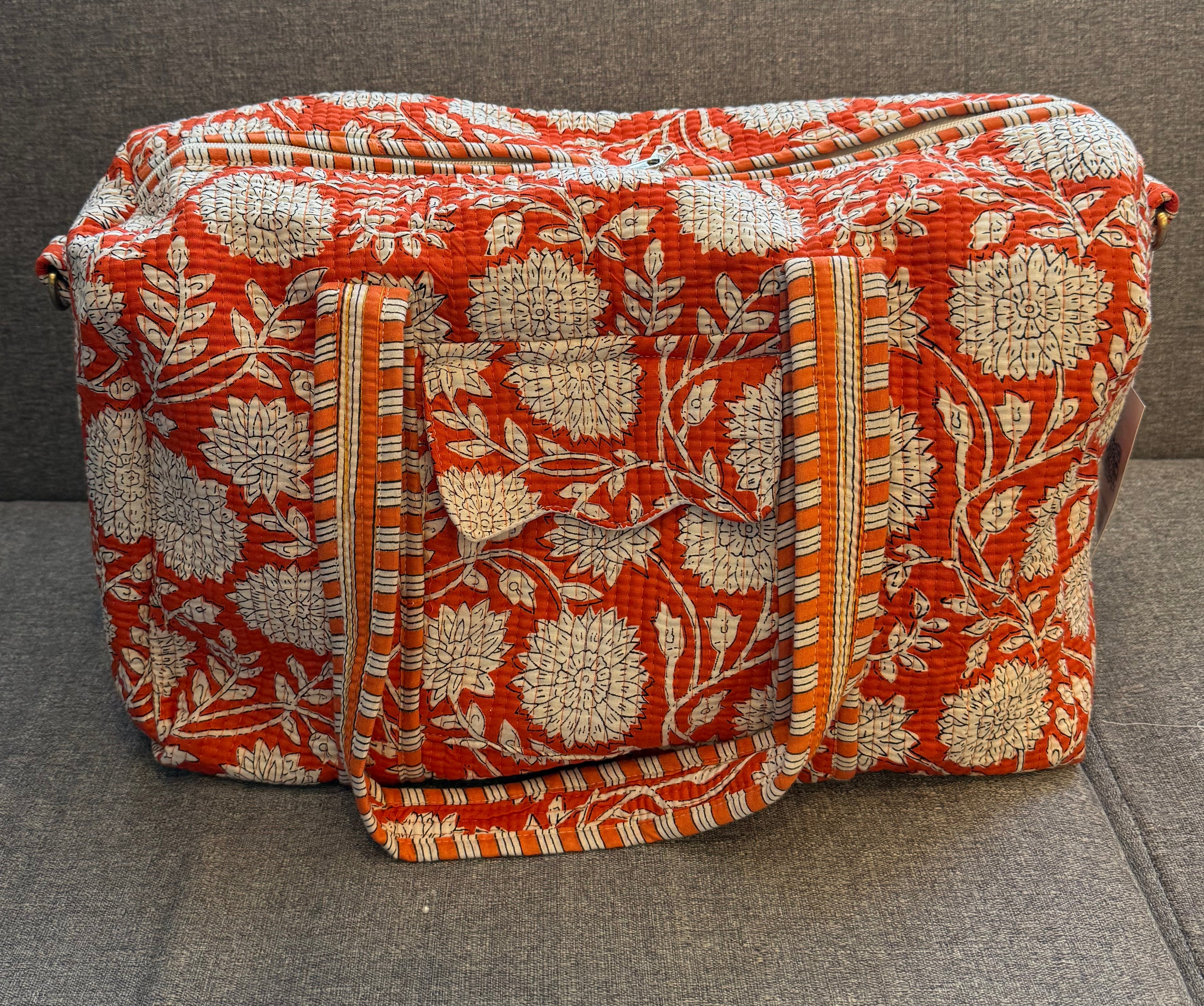 The Sunset Bloom Quilted Duffle