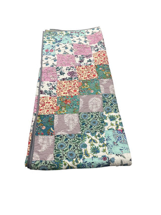 Reversible floral patchwork queen-size cotton quilt.