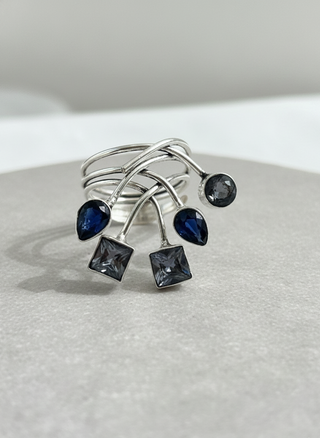 The Midnight Cascade Ring